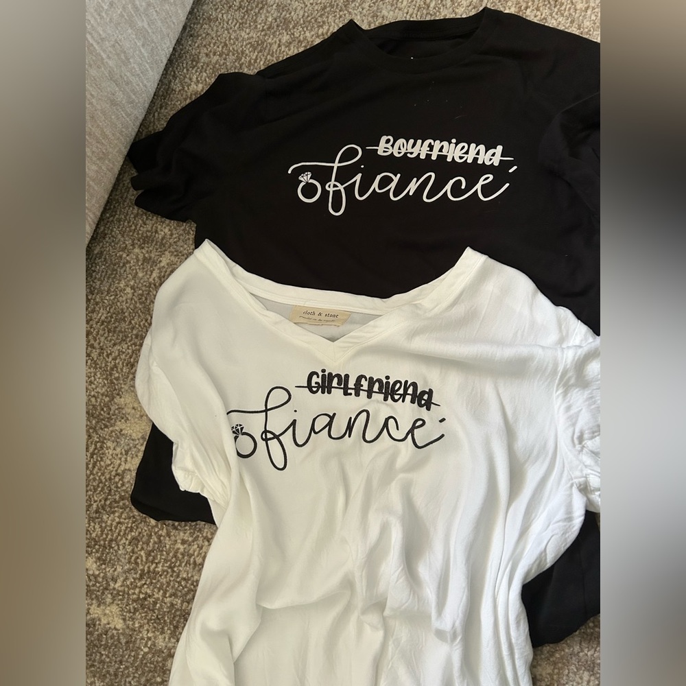 His & hers fiancée shirts. Men’s large and Women’s large.